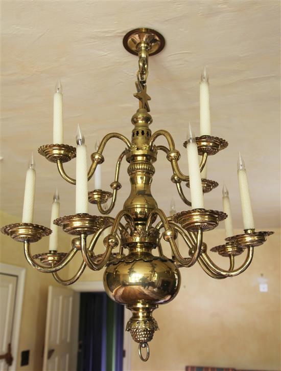 A late 19th century Dutch brass twelve light chandelier, length 39in.